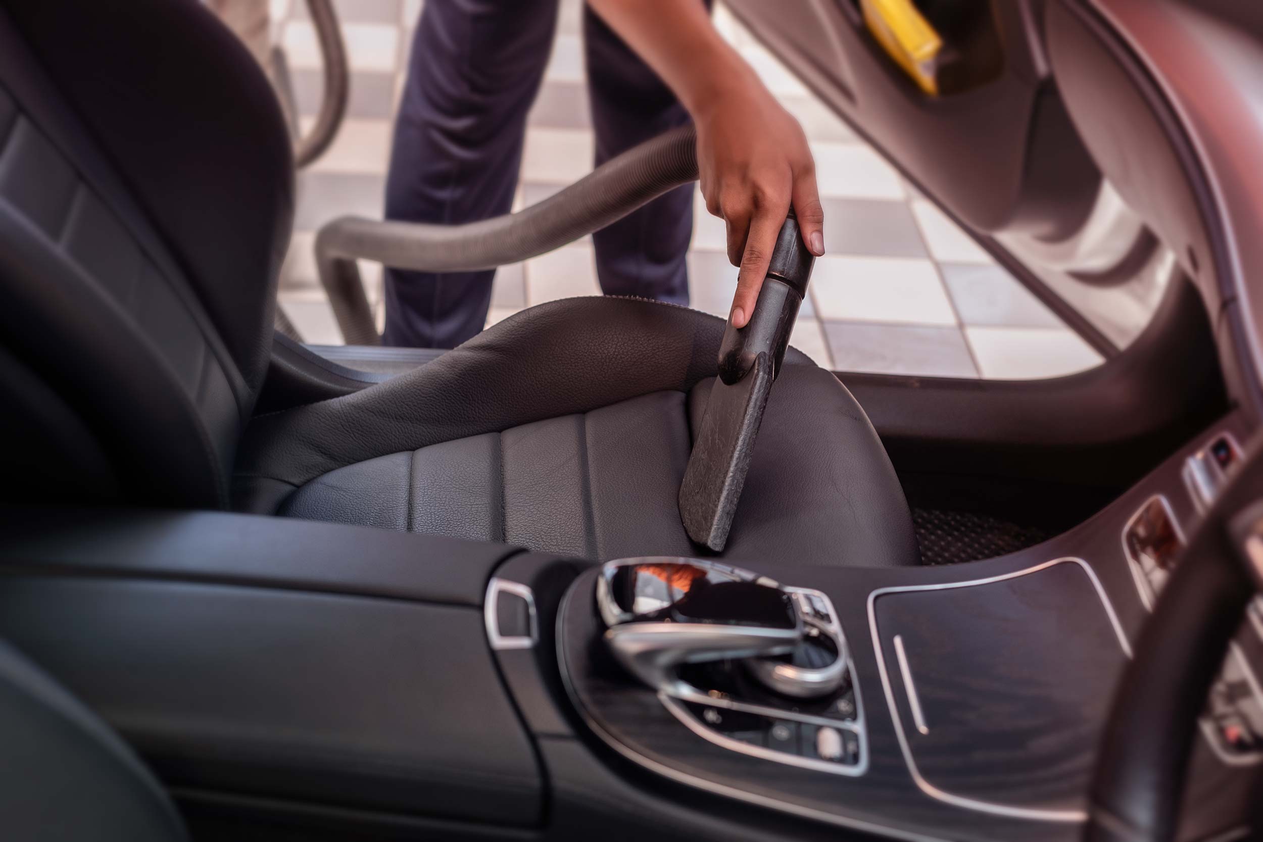 Professional car care service with careful attention to vehicle surfaces